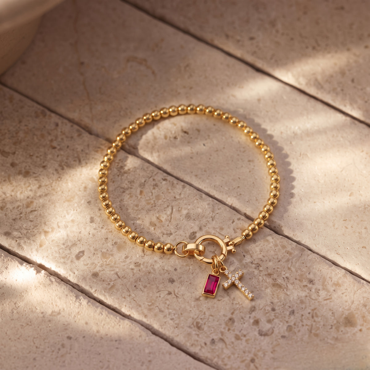 Pulsera de cruz con piedra natal